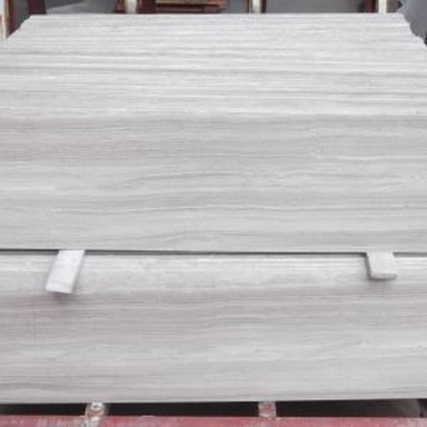 Azulejos de mármol blanco de madera