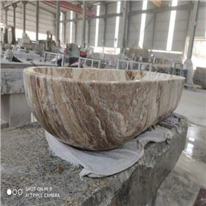 Baño de piedra de travertino