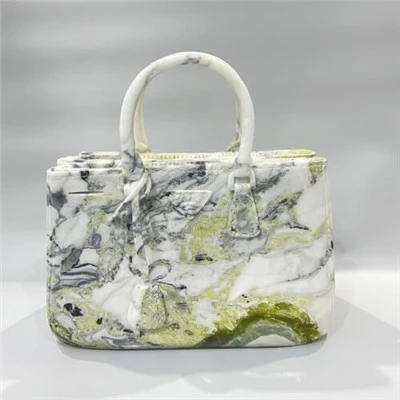 Bolso tallado en mármol de belleza blanca
